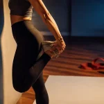 Etirement pour les jambes : quadriceps contre un mur